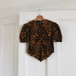 Ashley Williams tiger print top at Palace of Nowhere
