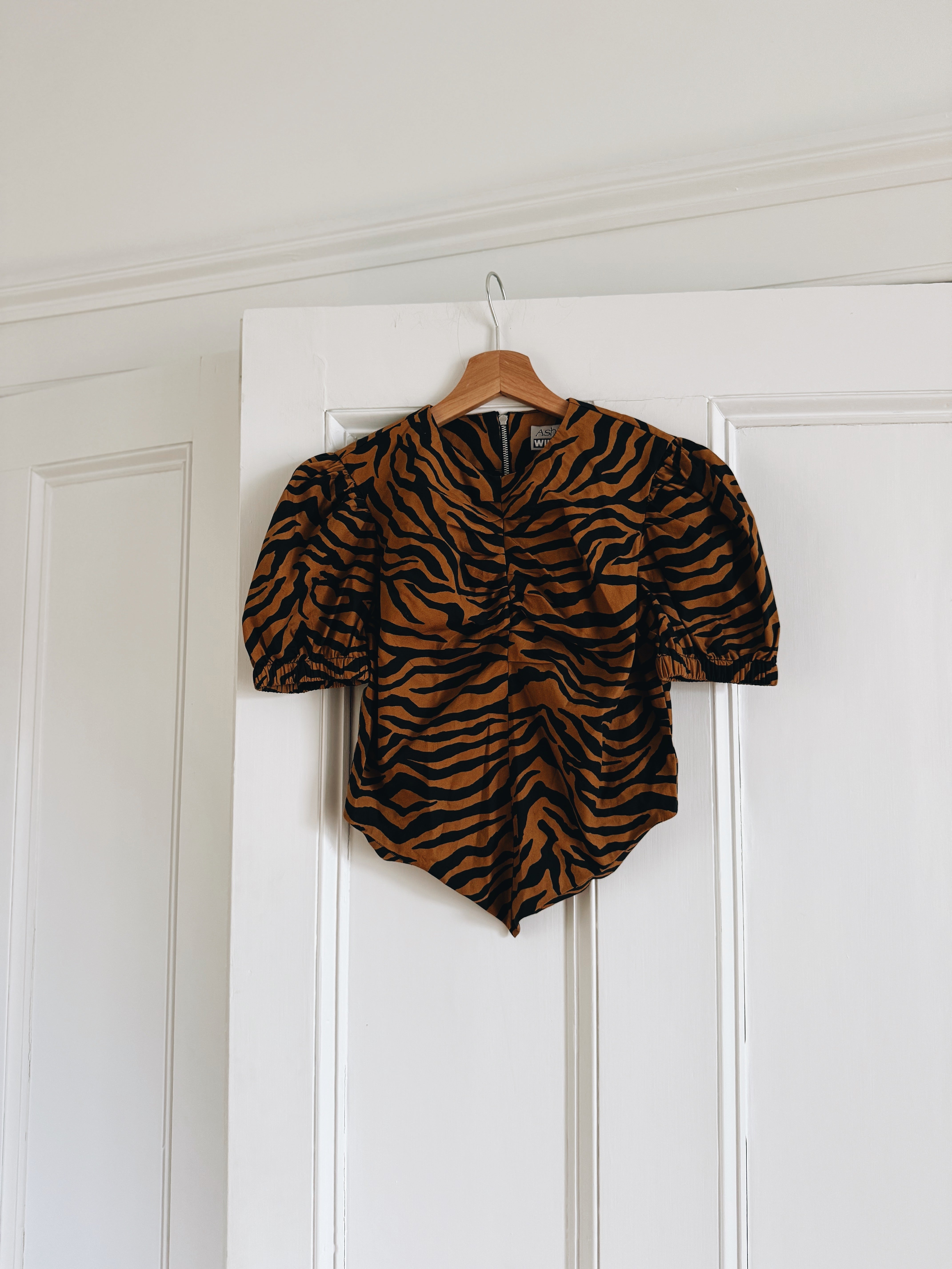 Ashley Williams tiger print top at Palace of Nowhere