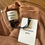 Camille Rowe x Reformation Bevelyn rose gold sequin dress Palace of Nowhere