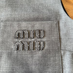 Miu Miu Grisaille logo embroidered sleeveless top Palace of Nowhere