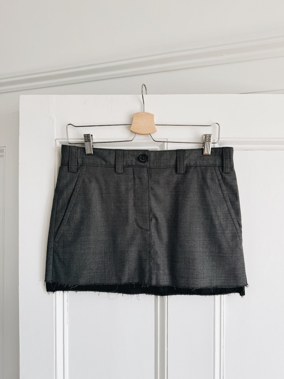 Miu Miu Grisaille logo grey virgin wool skirt Palace of Nowhere