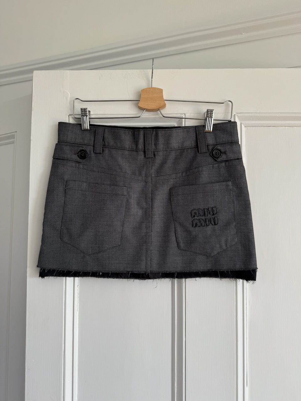 Miu Miu Grisaille logo grey virgin wool skirt Palace of Nowhere
