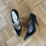 Miu Miu black embossed patent leather heels Palace of Nowhere