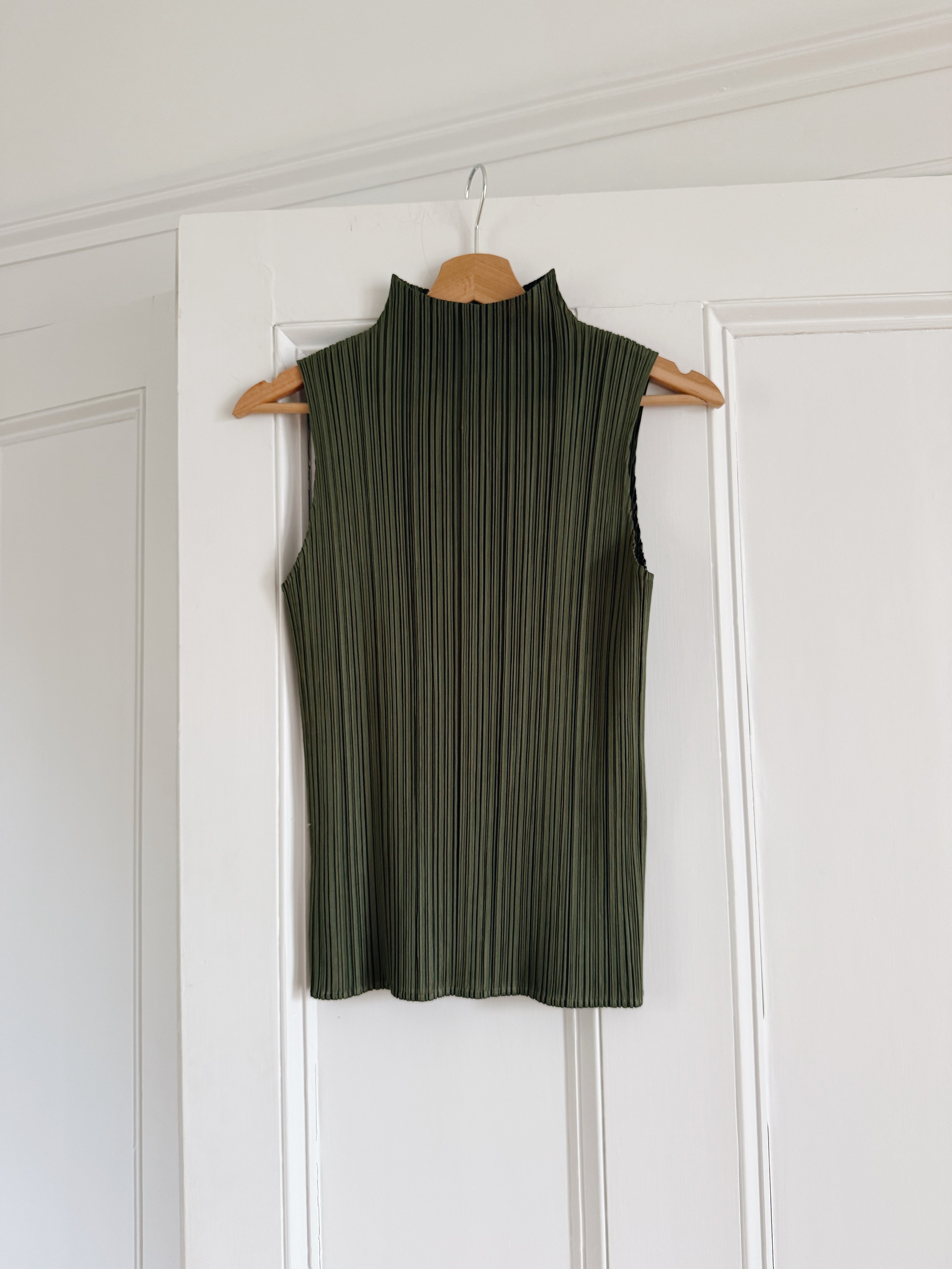 Shop Issey Miyake Pleats Please funnel neck top in khaki green at Palace of Nowhere