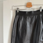 Vintage Prada Y2K black leather midi skirt at Palace of Nowhere