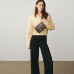 Chylak glossy brown crocodile leather belt bag at Palace of Nowhere