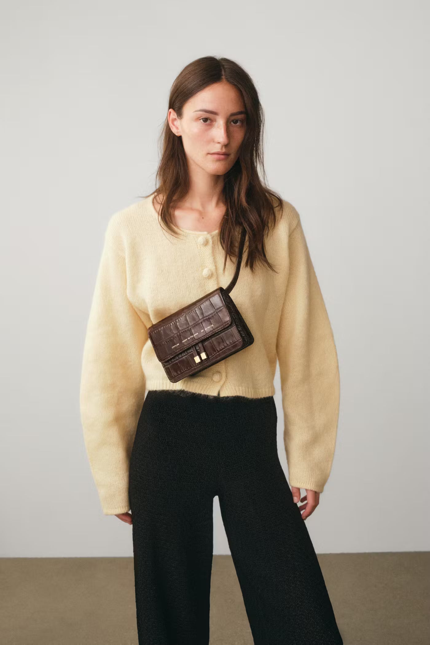 Chylak glossy brown crocodile leather belt bag at Palace of Nowhere